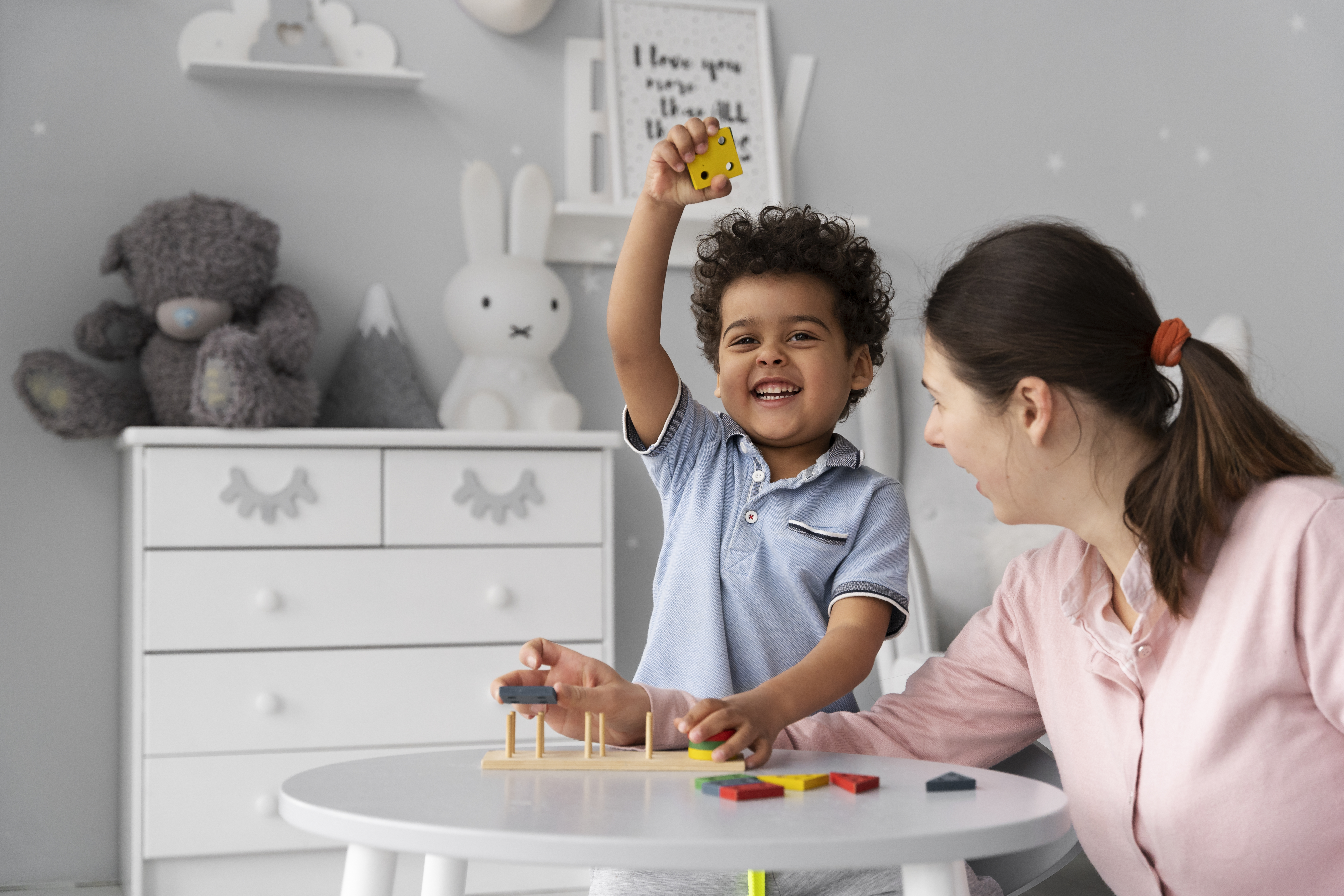 close-up-child-enjoying-didactic-game (1)